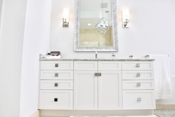 All White Diamond Bathroom Cabinets and White Countertops