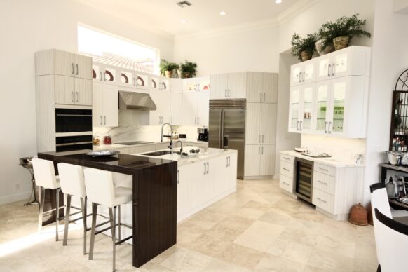 Contemporary UltraCraft Cabinets and Porcelain Countertop