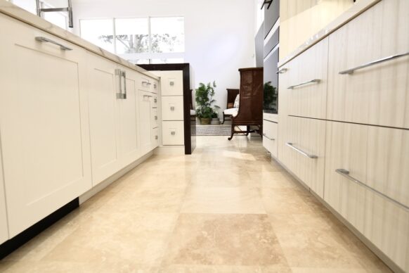 Contemporary White UltraCraft Cabinets and Porcelain Countertop