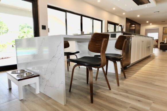 Ultra Modern Two Toned Kitchen Tables Cabinets and Quartz Countertops