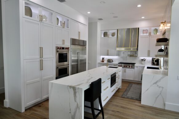 White UltraCraft Cabinets with White Porcelain Countertop