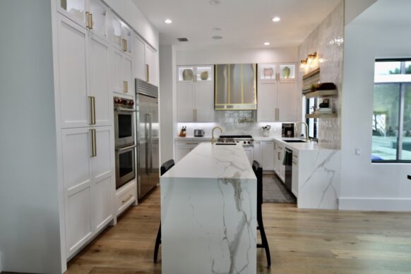 White UltraCraft Cabinets with White Porcelain Countertops