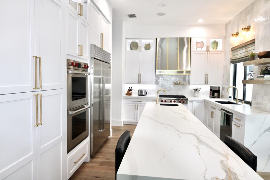 White UltraCraft Cabinets with White Porcelain Countertops Too